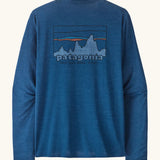 Patagonia men's long sleeve capilene techincal t-shirt in blue with 73 skyline inspired brand print on upper back