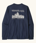 Patagonia men's long sleeve hut tripper skyline tshirt in new navy with a white branded mountain ridge graphic on the upper back