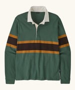 Patagonia men's long sleeved buttoned rugby shirt in canopy green with a continuous brown block strip on the middle and white collar
