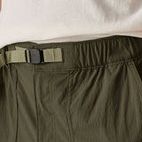 Close up of Patagonia men's outdoor everyday quick drying shorts in green showing light green belt.