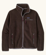 Patagonia men's retro pile fleece jacket in den brown with grey trim. Features a full front zip, chest and side pockets