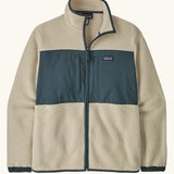 Patagonia men's retro pile patch jacket in beige with a navy trim and chest panel. Features chest pockets and elasticated cuffs