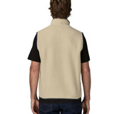 Back of man wearing Patagonia men's retro pile vest in beige with a navy trim. Gilet has a relaxed fit