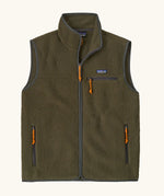 Patagonia men's retro pile vest in dark green with grey trim. A warm fleece gilet with a front zip, chest and side pockets