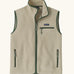 Patagonia men's retro pile vest in beige with a green trim. A warm fleece gilet with a front zip, chest and side pockets