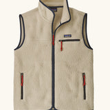 Patagonia men's retro pile fleece vest in beige with a dark blue trim. Features a full front zip, chest and side pockets