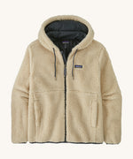 Flat lay front product shot of the Patagonia Men’s Retro-X Fleece Hoody Jacket in Dark Natural, showing the full zip, drawcord hood and zippered handwarmer pockets.