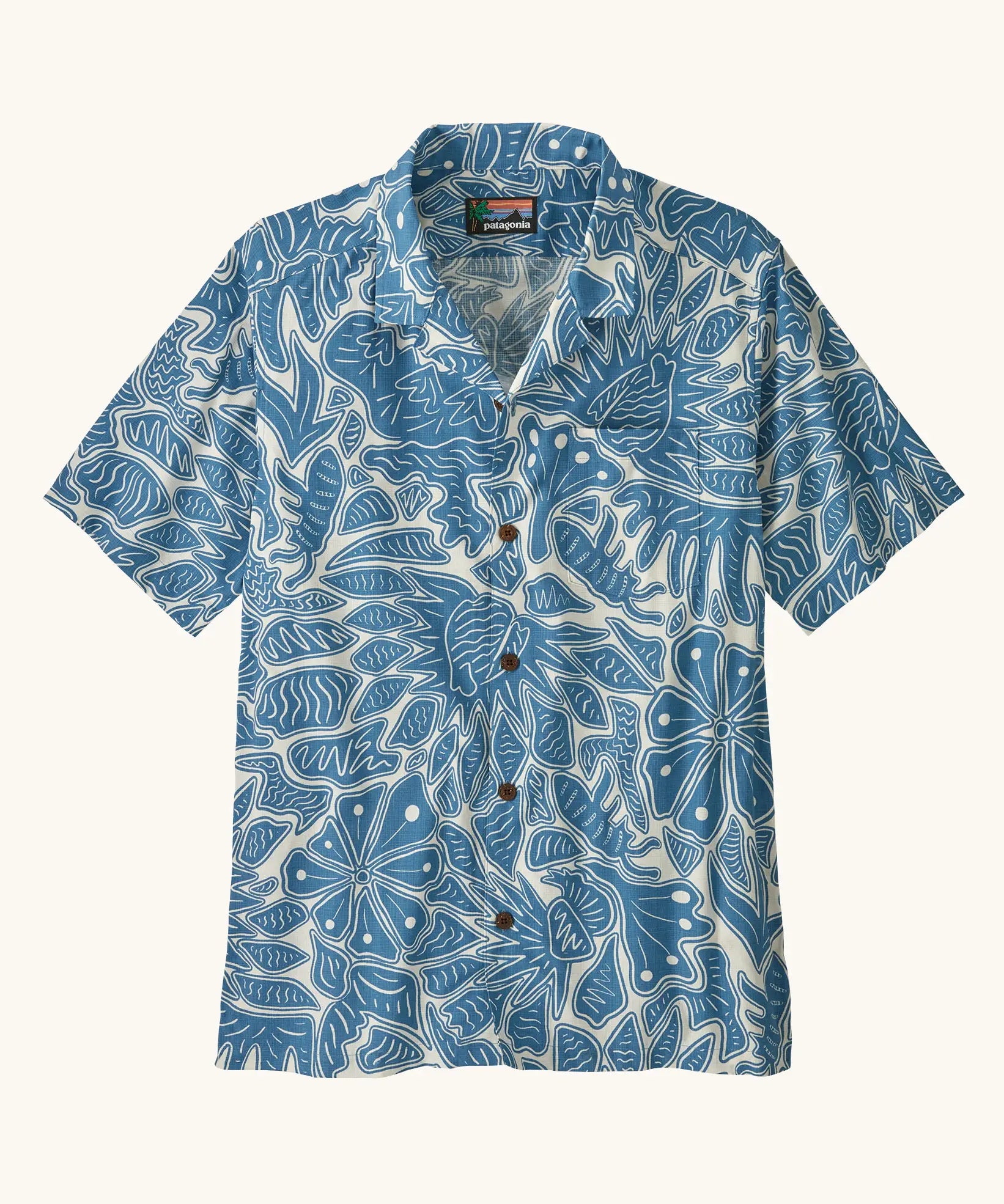 Patagonia men's tidal threads camp short sleeve shirt with light blue and cream Hawaiian aloha inspired prints 