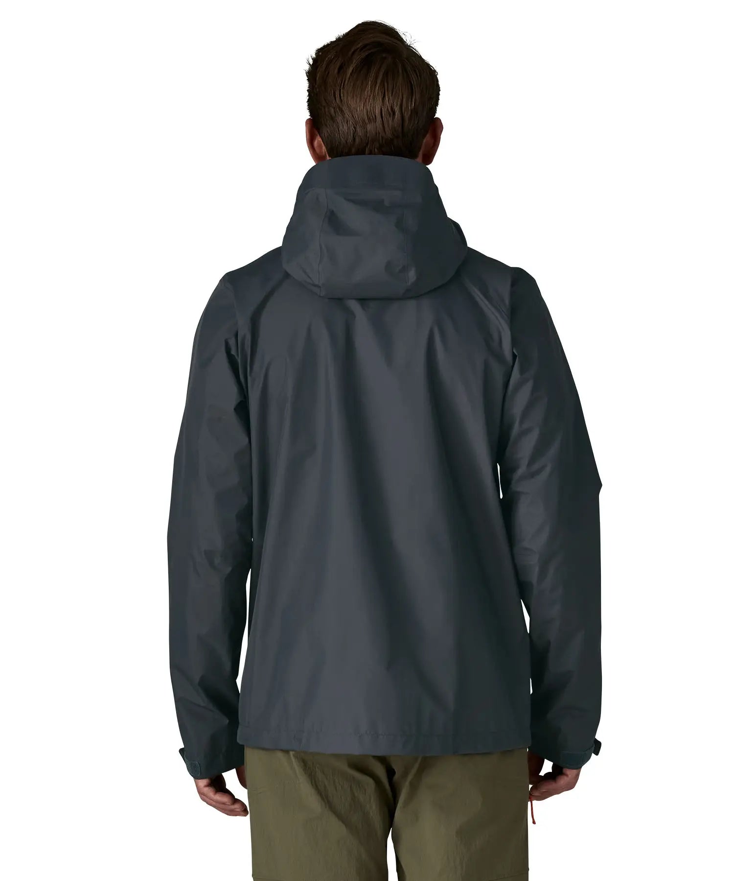 Back of man wearing the Patagonia men's torrentshell 3 layer rain jacket in smolder blue. Jacket has a relaxed fit