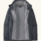 An open Patagonia men's torrentshell 3 layer waterproof rain jacket in smolder blue. showing microfibre fleece panel on the neck for warmth