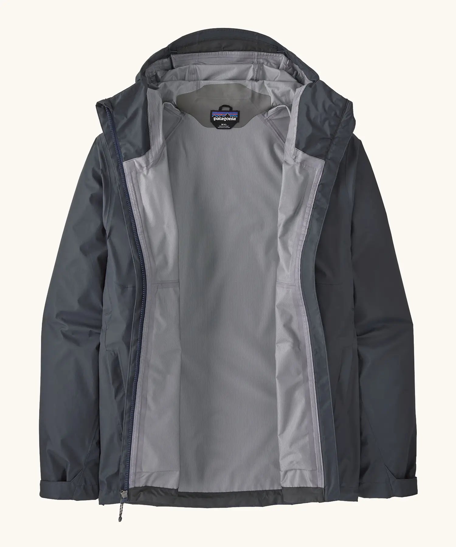 An open Patagonia men's torrentshell 3 layer waterproof rain jacket in smolder blue. showing microfibre fleece panel on the neck for warmth