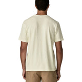 Back of man wearing Patagonia's men's trail harbour short sleeve tee in cream. T-shirt has a relaxed fit and sits at the hips