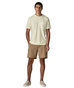 Man wearing Man wearing Patagonia's men's trail harbour short sleeve tee in cream with pouch pocket