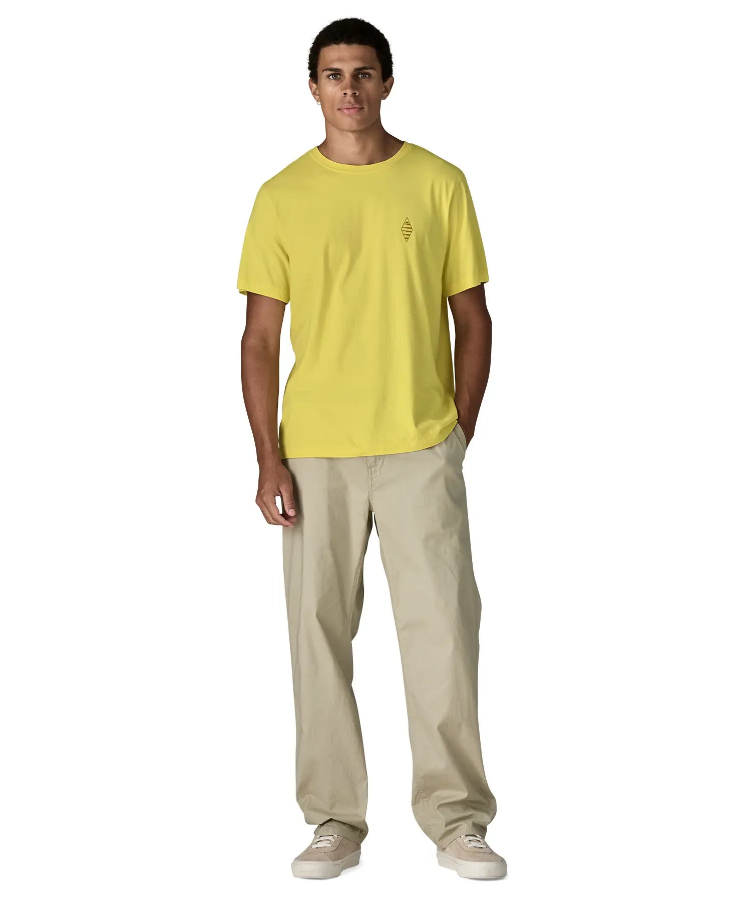 Man wearing Patagonia men's water people spotter short sleeve t-shirt in yellow. T-shirt has a relaxed fit 