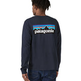 A person showing the fit of the Patagonia L/S P-6 Logo Responsibili-Tee - New Navy from the back