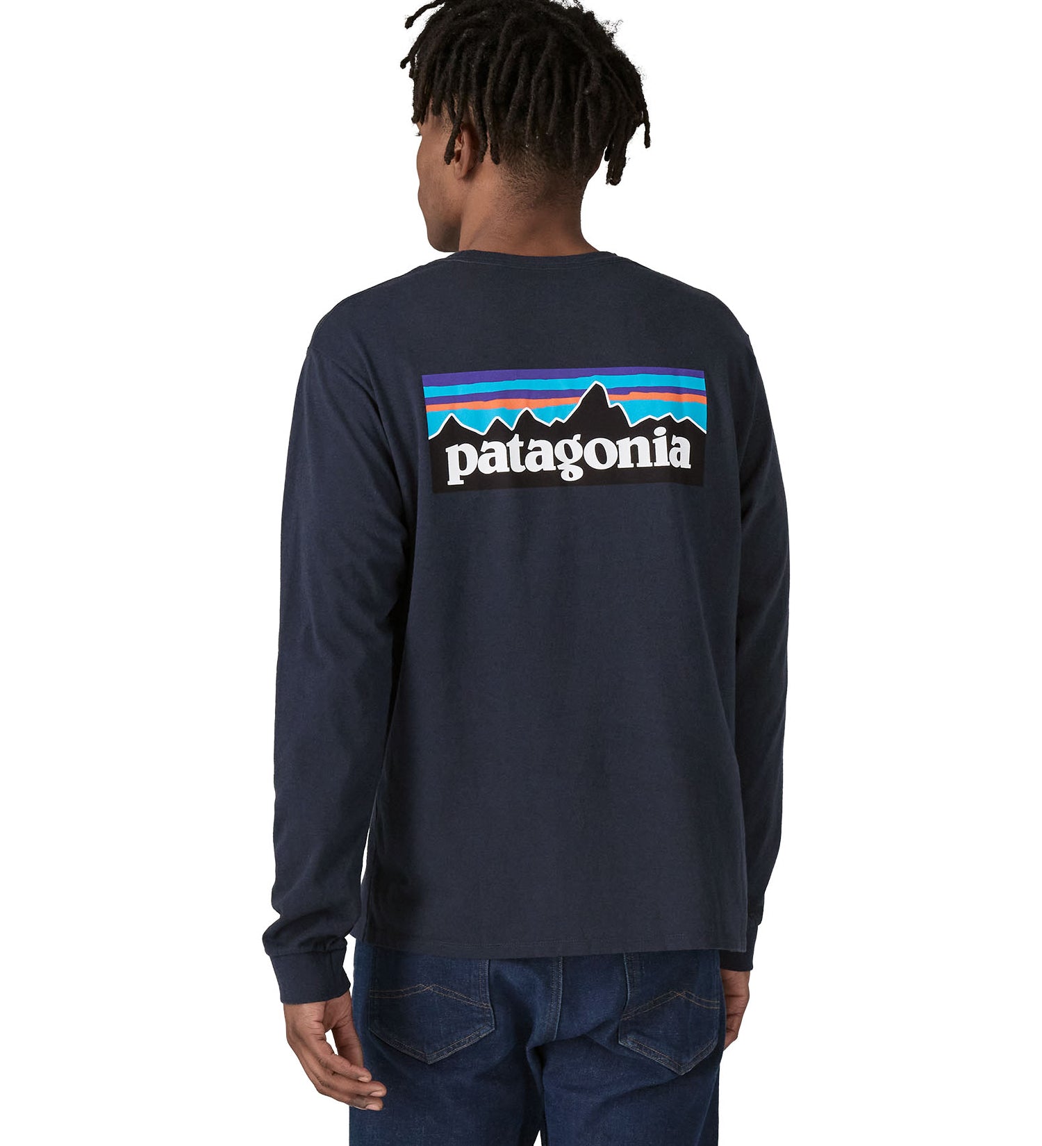 A person showing the fit of the Patagonia L/S P-6 Logo Responsibili-Tee - New Navy from the back
