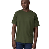 Dark green Patagonia Short sleeve t-shirt being worn my an adult. The front of the t-shirt has the word "Patagonia" in small writing