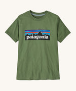 Patagonia KidsT-Shirt - Green. An army green, organic cotton t-shirt with the Patagonia mountain range logo on the front