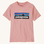 Patagonia KidsT-Shirt in Mallow Pink. A baby pink t-shirt made from organic cotton with the Patagonia mountain logo on the front.