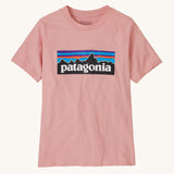 Patagonia KidsT-Shirt in Mallow Pink. A baby pink t-shirt made from organic cotton with the Patagonia mountain logo on the front.