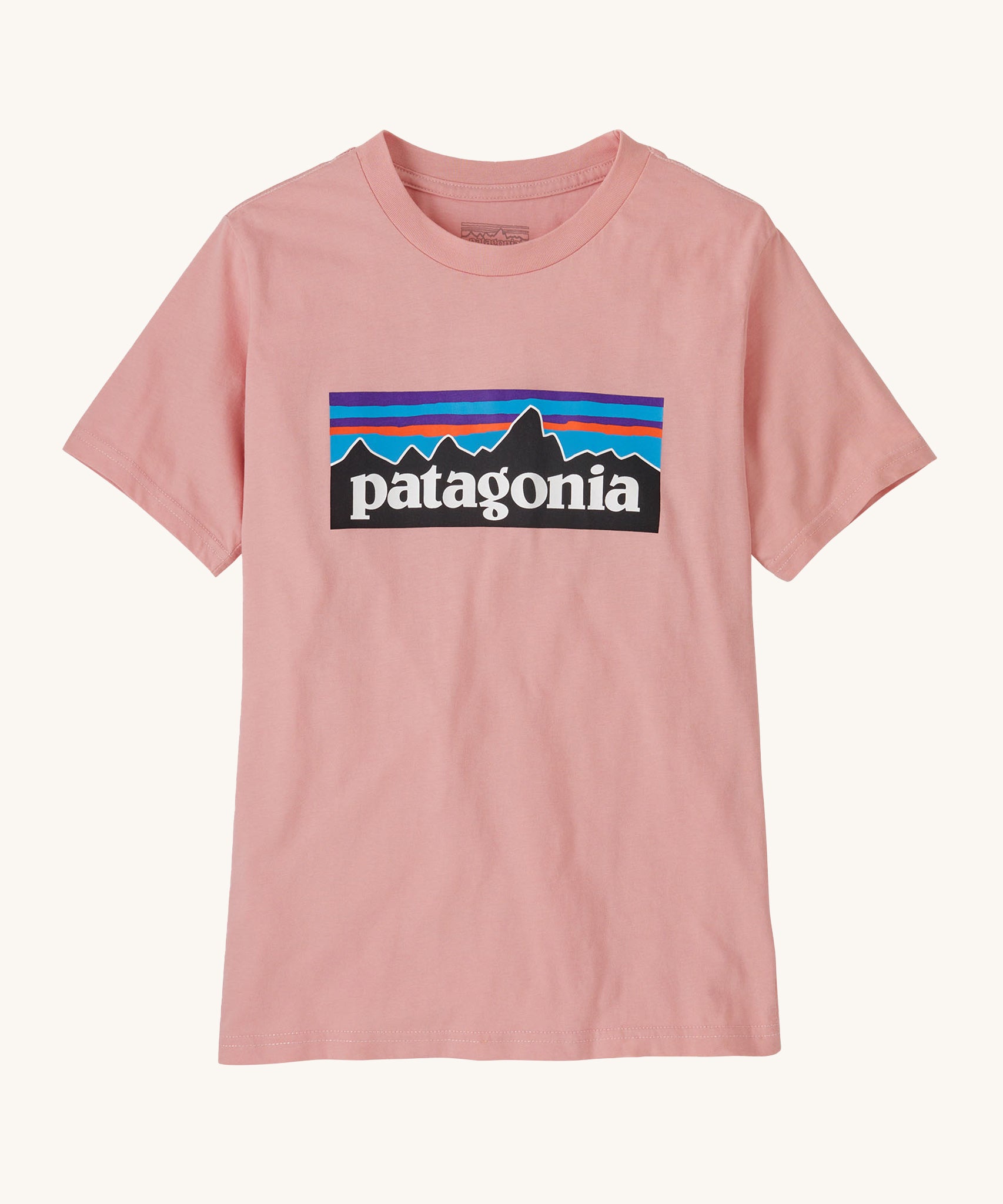 Patagonia KidsT-Shirt in Mallow Pink. A baby pink t-shirt made from organic cotton with the Patagonia mountain logo on the front.