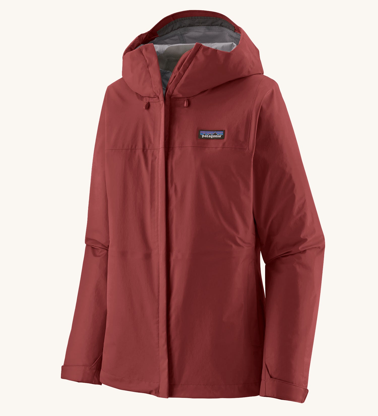 Patagonia Women's Torrentshell 3L Rain Jacket - Oxide Red zipped up the front, on a cream background.