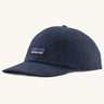 Patagonia organic cotton p6 label trad cap in navy. Shows air holes on the top and brand patch on the front