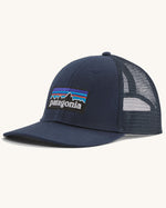 Patagonia p6 logo lopro trucker hat in navy with a breathable mesh back panel and logo patch on the front.
