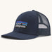 Patagonia p6 logo lopro trucker hat in navy with a breathable mesh back panel and logo patch on the front.