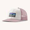 Patagonia p6 logo trucker hat in white with a pink breathable mesh back panel and visor