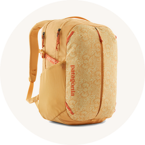 Patagonia 26L refugio backpack on cream background to represent Patagonia packs and gear at Babipur.