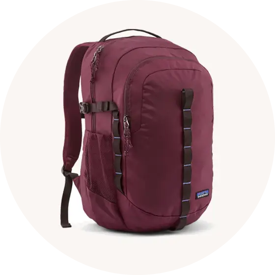 Button for Patagonia Packs and gear collection at Babipur, with Refugio Day Pack, 26 Litre Backpack in Berry Fig representing the page. 