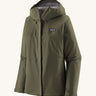 Patagonia Women's Torrentshell 3L Rain Jacket - Pine Needle Green zipped up the front, on a cream background.