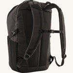 The back of the Patagonia Refugio Day Pack 30L Black, showing the shoulder straps and chest strap