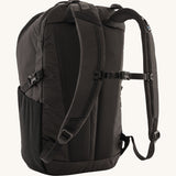 The back of the Patagonia Refugio Day Pack 30L Black, showing the shoulder straps and chest strap