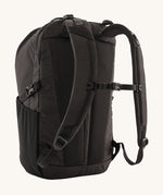 The back of the Patagonia Refugio Day Pack 30L Black, showing the shoulder straps and chest strap