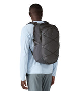 A person wearing the Patagonia Refugio Day Pack 30L  Smolder Blue, showing the front of the bag