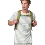 A person wearing the Patagonia Refugio Day Pack 26L, showing the chest straps