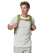 A person wearing the Patagonia Refugio Day Pack 26L, showing the chest straps