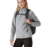 A person wearing the Patagonia Refugio Day Pack 26L Smolder Blue