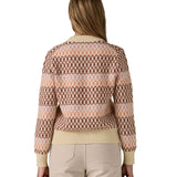 The back of a woman wearing the Patagonia Women's Recycled Wool-Blend Crewneck Sweater - Starlight / Dark Natural available at Babipur.