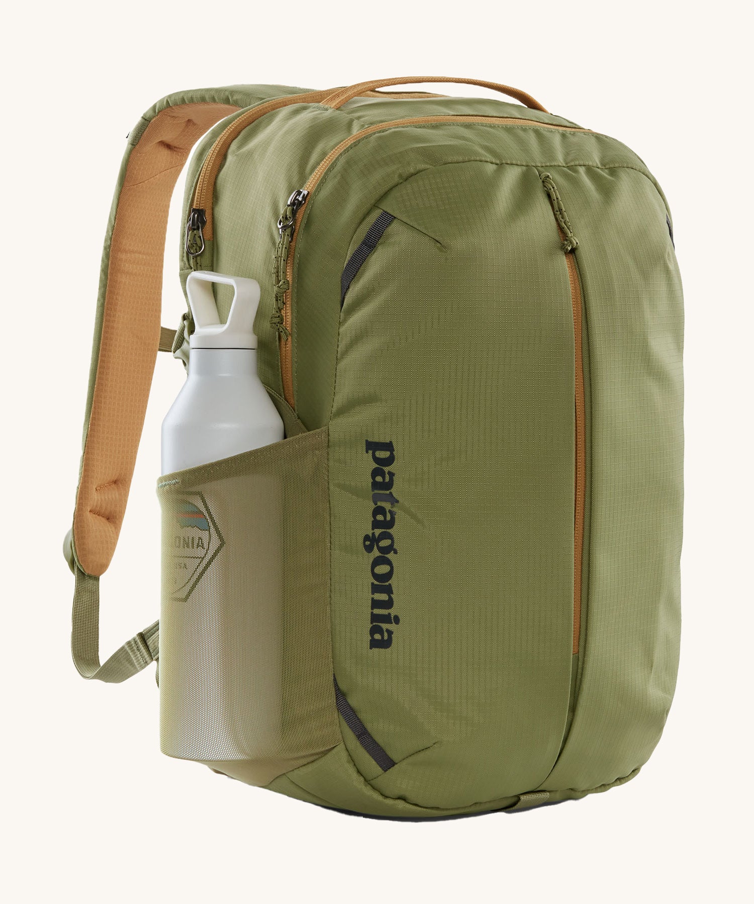 A Patagonia Refugio Day Pack 26L with a water bottle in the mesh side pocket