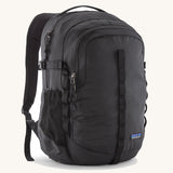 Patagonia refugio 26L back pack in black with matching black straps buckles and mesh side pockets