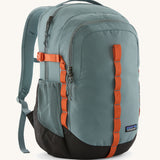 Patagonia refugio 26L back pack in sage blue with orange straps buckles and mesh side pockets