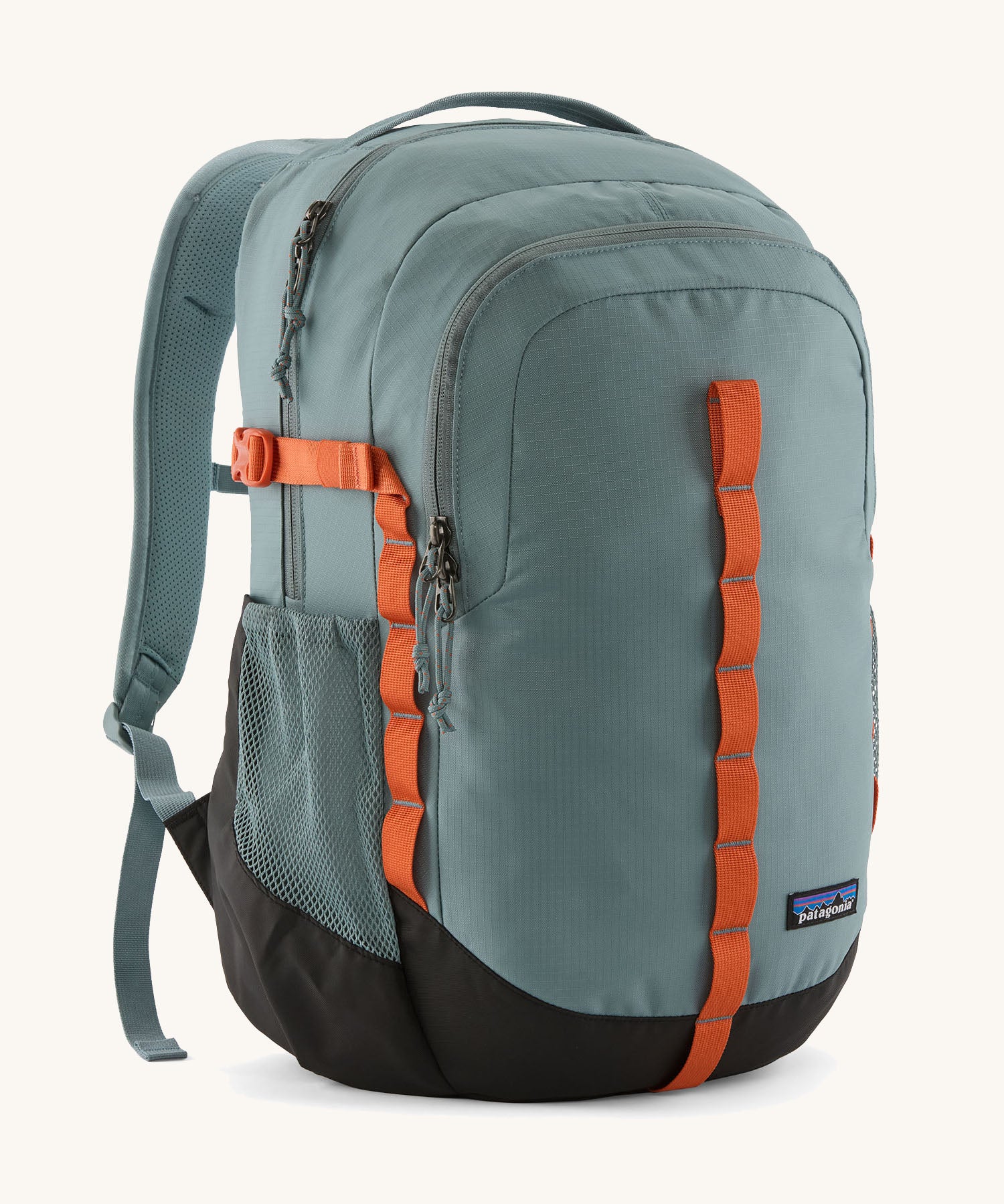 Patagonia refugio 26L back pack in sage blue with orange straps buckles and mesh side pockets