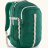 Patagonia refugio 26L back pack in green with cream straps buckles and green mesh side pockets