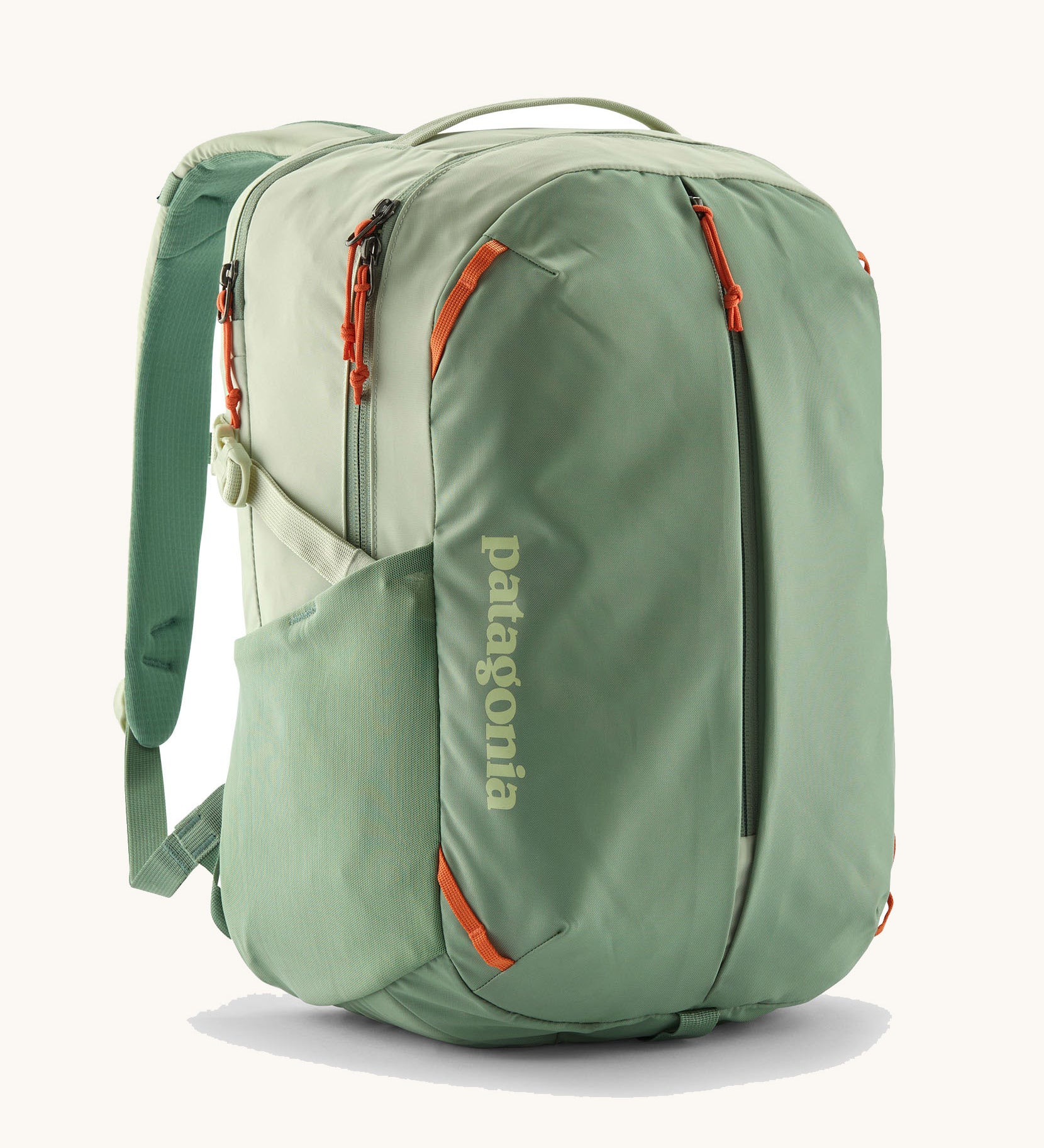 Patagonia refugito day pack 26 litres in lichen green. A 100% recycled material backpack in pastel green with orange detail. Features padded shoulder straps, mesh side pockets and 3 main compartments. 
