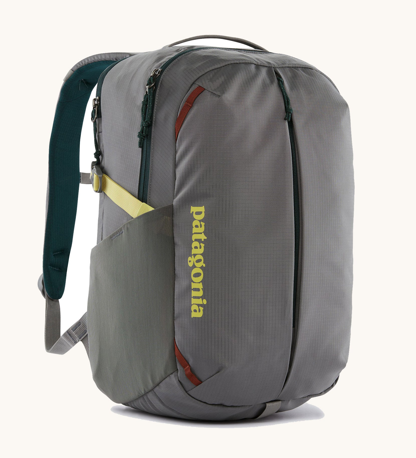 Patagonia refugito day pack 26 litres in noble grey. A 100% recycled material backpack in grey with yellow, green and brwon detail. Features padded shoulder straps, mesh side pockets and 3 main compartments. 