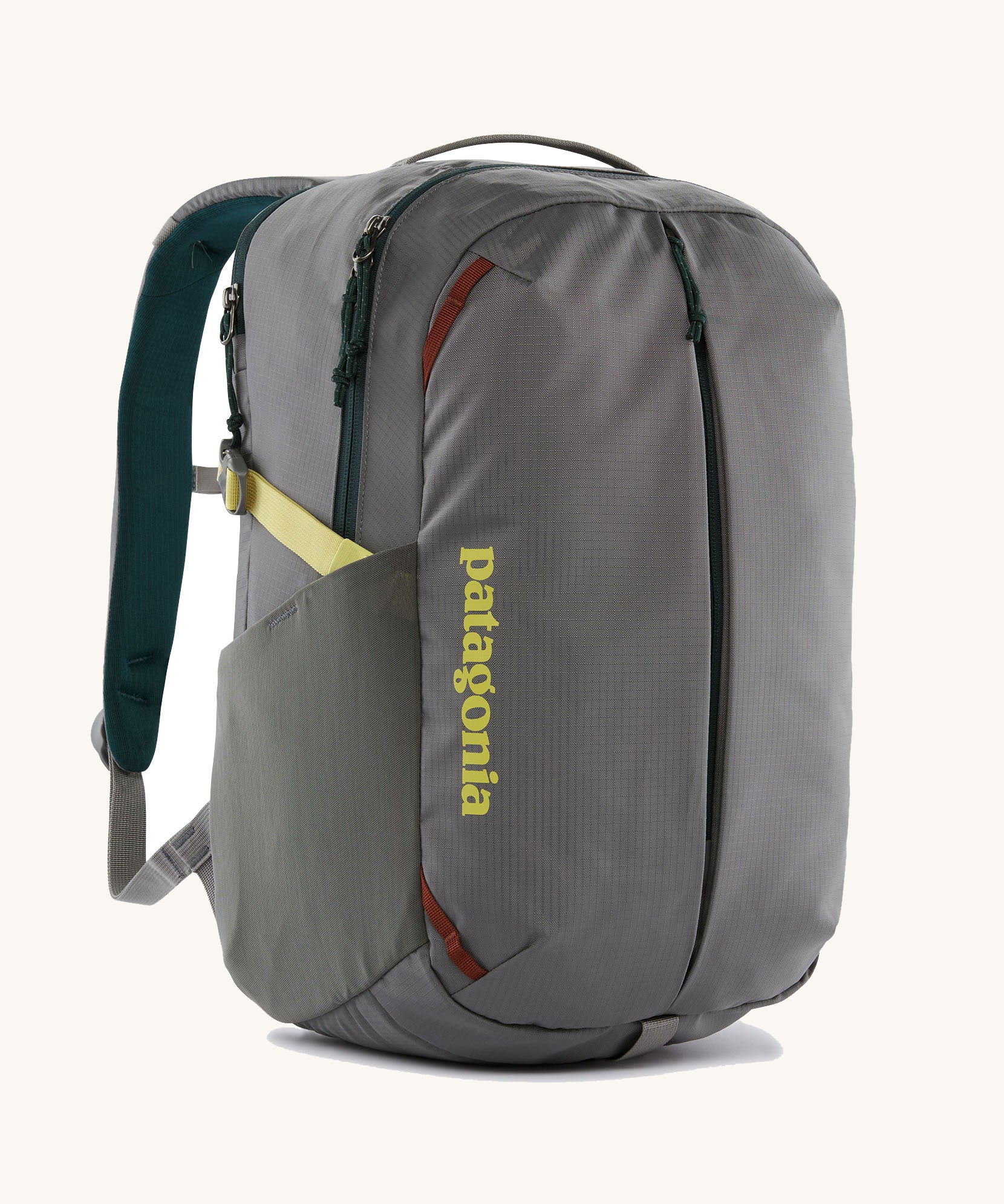 Patagonia refugito day pack 26 litres in noble grey. A 100% recycled material backpack in grey with yellow, green and brwon detail. Features padded shoulder straps, mesh side pockets and 3 main compartments. 