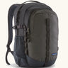 Patagonia refugio 26L back pack in dark blue with black straps buckles and mesh side pockets